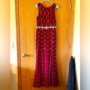 Elegant long red lace dress.